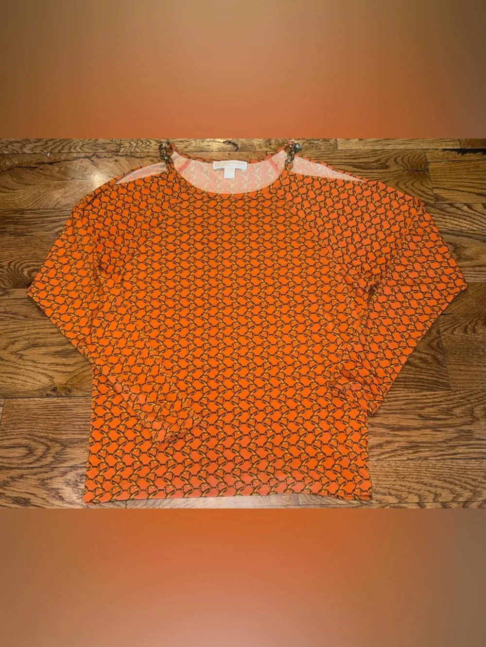 Michael Kors. Cold Shoulder Orange Chain Blouse. Size Small.